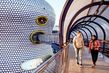 Students walking over bridge at Birmingham the Bullring