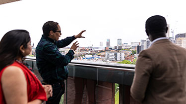 People observing the Birmingham city skyline