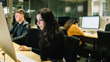 Female student working on a computer