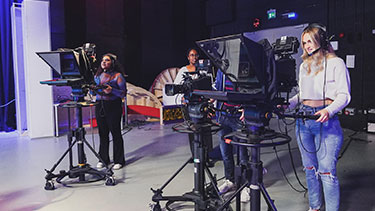 Media students using studio cameras