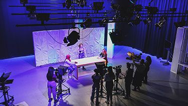 Media students on a studio sound stage