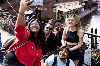 Students taking a group selfie