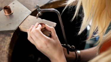 Student designing some jewellery
