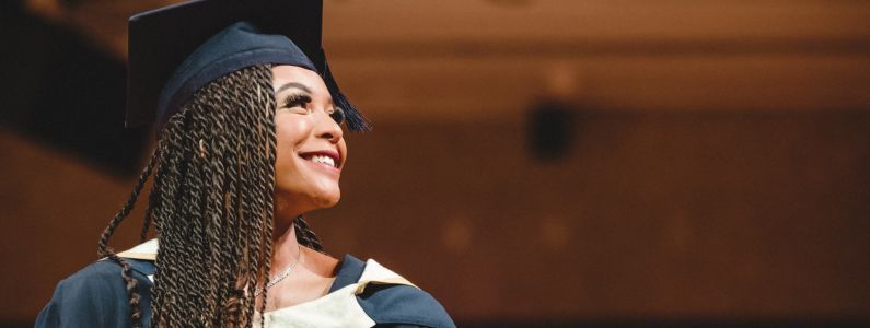 Female graduate smiling